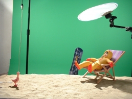 Eskimonika and naked pigeon on set during animation