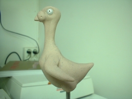 Naked pigeon stop-motion puppet sculpture