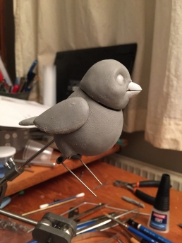 Early in the sculpting process of the bird puppet