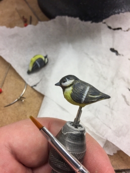 Painting the two birds for the hat decoration
