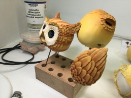 The Owl puppet during the paint job